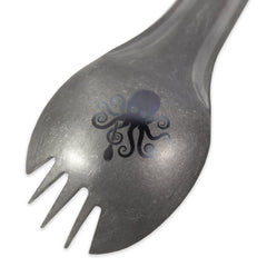 Laser etched SPD Kraken Spork graphic on underside of PDW titanium spork